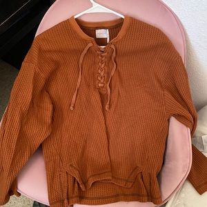 Brown sweater